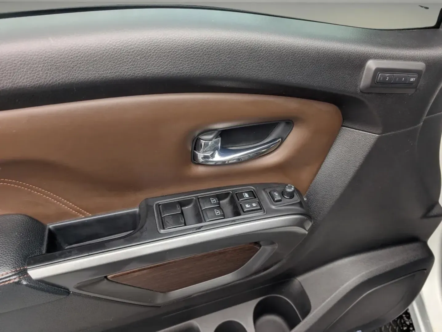 2018 /Black/Brown Nissan Titan Platinum Reserve (1N6AA1E59JN) with an Other engine, located at 804 22nd Ave, Phenix City, AL, 36870, (334) 297-1860, 32.484749, -85.024475 - Are you ready to elevate your driving experience and embrace a lifestyle filled with adventure? The 2018 Nissan Titan Platinum Reserve is here to make your journeys unforgettable! Whether you're navigating the bustling streets of Phenix City or heading off-road for a weekend getaway, this Crew Cab P - Photo#8