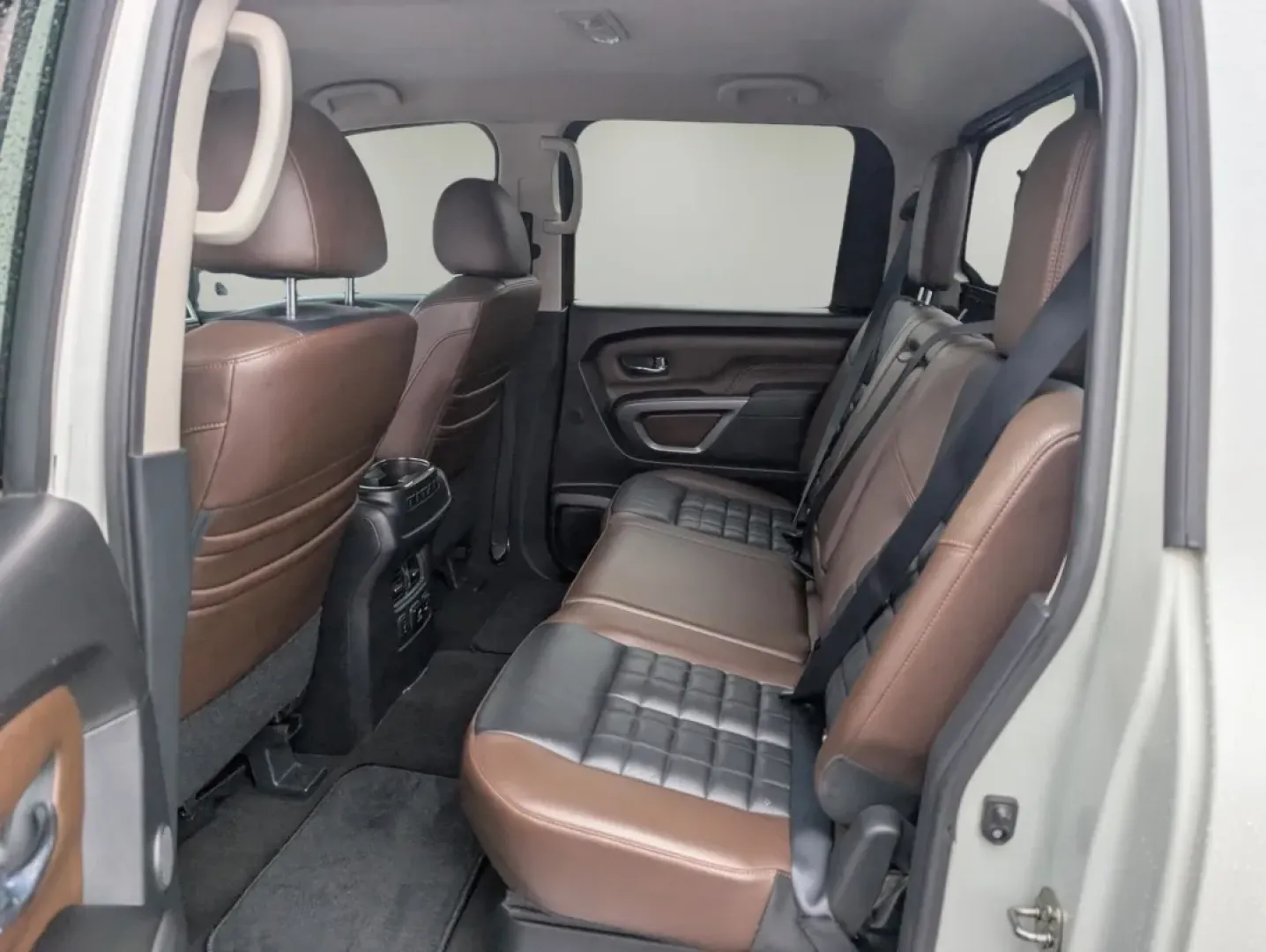 2018 /Black/Brown Nissan Titan Platinum Reserve (1N6AA1E59JN) with an Other engine, located at 804 22nd Ave, Phenix City, AL, 36870, (334) 297-1860, 32.484749, -85.024475 - Are you ready to elevate your driving experience and embrace a lifestyle filled with adventure? The 2018 Nissan Titan Platinum Reserve is here to make your journeys unforgettable! Whether you're navigating the bustling streets of Phenix City or heading off-road for a weekend getaway, this Crew Cab P - Photo#10