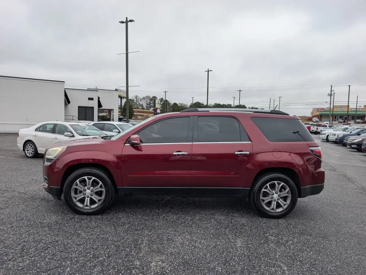 2016 /Dark Cashmere GMC Acadia SLT (1GKKRRKD9GJ) with an Other engine, located at 3959 U.S. 80 W, Phenix City, AL, 36870, (334) 297-4885, 32.469296, -85.135185 - **Discover the Ideal Family SUV: 2016 GMC Acadia SLT at Gils Auto in Opelika, AL!**<br /> <br /> Are you seeking the perfect vehicle for family adventures, weekend getaways, or daily commutes? Look no further! The 2016 GMC Acadia SLT is designed with your lifestyle in mind. With its spacious interio - Photo#7
