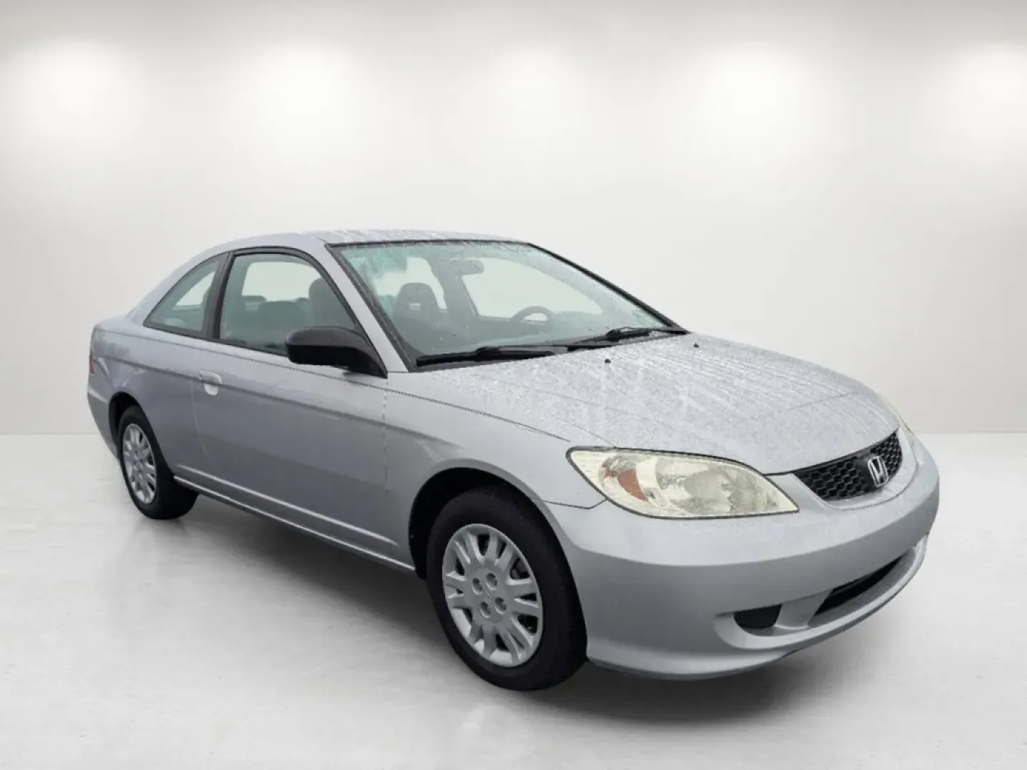 2005 Honda Civic Cpe LX (1HGEM22595L) with an Other engine, located at 3959 U.S. 80 W, Phenix City, AL, 36870, (334) 297-4885, 32.469296, -85.135185 - **Elevate Your Daily Commute with the 2005 Honda Civic Cpe LX!**<br /> <br /> Are you looking for a reliable vehicle that perfectly balances style, efficiency, and affordability? The 2005 Honda Civic Cpe LX is a fantastic choice for budget-conscious buyers and anyone in need of dependable transporta - Photo#2