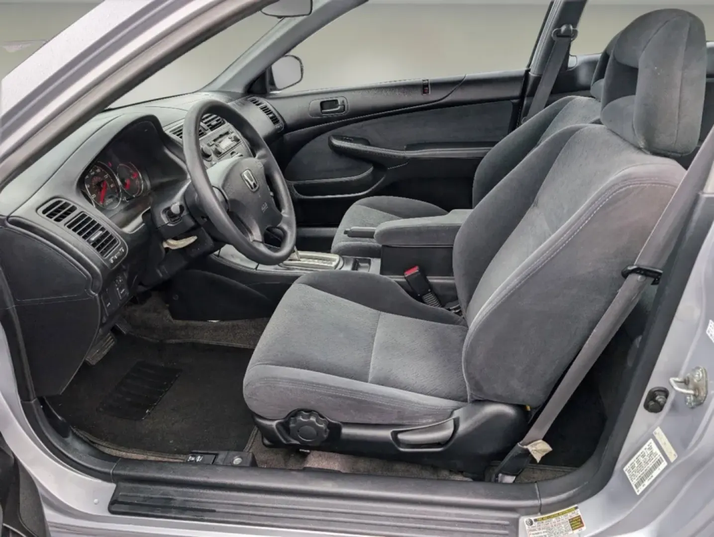 2005 Honda Civic Cpe LX (1HGEM22595L) with an Other engine, located at 3959 U.S. 80 W, Phenix City, AL, 36870, (334) 297-4885, 32.469296, -85.135185 - **Elevate Your Daily Commute with the 2005 Honda Civic Cpe LX!**<br /> <br /> Are you looking for a reliable vehicle that perfectly balances style, efficiency, and affordability? The 2005 Honda Civic Cpe LX is a fantastic choice for budget-conscious buyers and anyone in need of dependable transporta - Photo#9