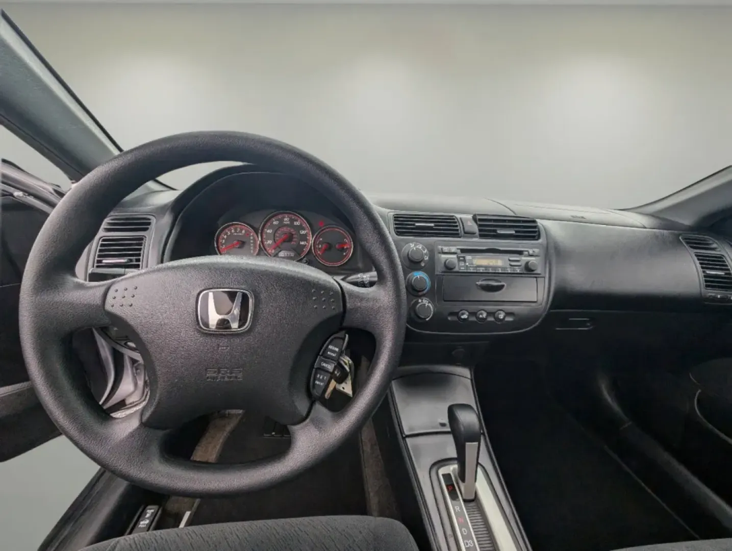 2005 Honda Civic Cpe LX (1HGEM22595L) with an Other engine, located at 3959 U.S. 80 W, Phenix City, AL, 36870, (334) 297-4885, 32.469296, -85.135185 - **Elevate Your Daily Commute with the 2005 Honda Civic Cpe LX!**<br /> <br /> Are you looking for a reliable vehicle that perfectly balances style, efficiency, and affordability? The 2005 Honda Civic Cpe LX is a fantastic choice for budget-conscious buyers and anyone in need of dependable transporta - Photo#11