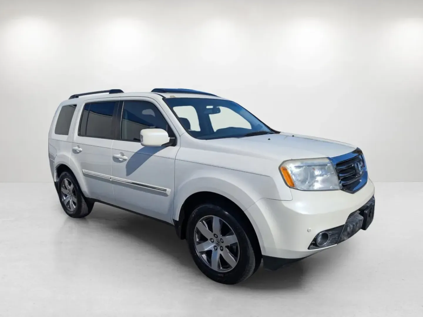2013 Honda Pilot Touring (5FNYF3H95DB) with an Other engine, located at 804 22nd Ave, Phenix City, AL, 36870, (334) 297-1860, 32.484749, -85.024475 - **Discover the 2013 Honda Pilot Touring Your Ultimate Family Adventurer at Gils Auto in Phenix City!**<br /> <br /> Are you ready to elevate your family adventures or elevate your daily commute? The 2013 Honda Pilot Touring is the perfect SUV for those who value space, comfort, and reliability. Wit - Photo#2