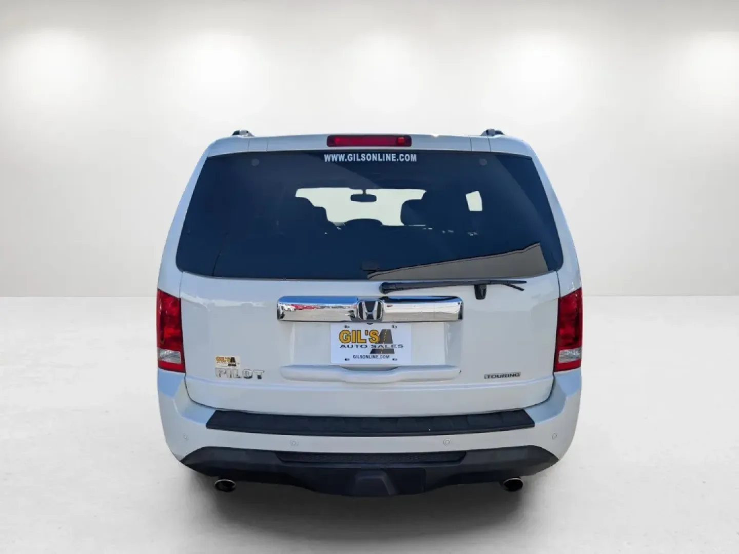 2013 Honda Pilot Touring (5FNYF3H95DB) with an Other engine, located at 804 22nd Ave, Phenix City, AL, 36870, (334) 297-1860, 32.484749, -85.024475 - **Discover the 2013 Honda Pilot Touring Your Ultimate Family Adventurer at Gils Auto in Phenix City!**<br /> <br /> Are you ready to elevate your family adventures or elevate your daily commute? The 2013 Honda Pilot Touring is the perfect SUV for those who value space, comfort, and reliability. Wit - Photo#5